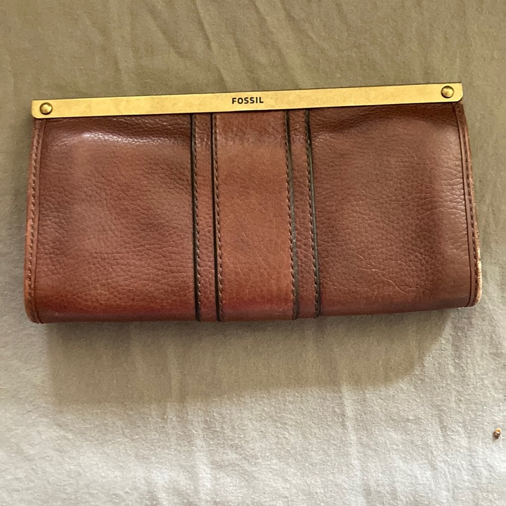 Genuine leather Fossil wallet with brass hardware